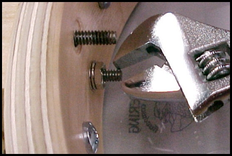Tighten upper lagscrew